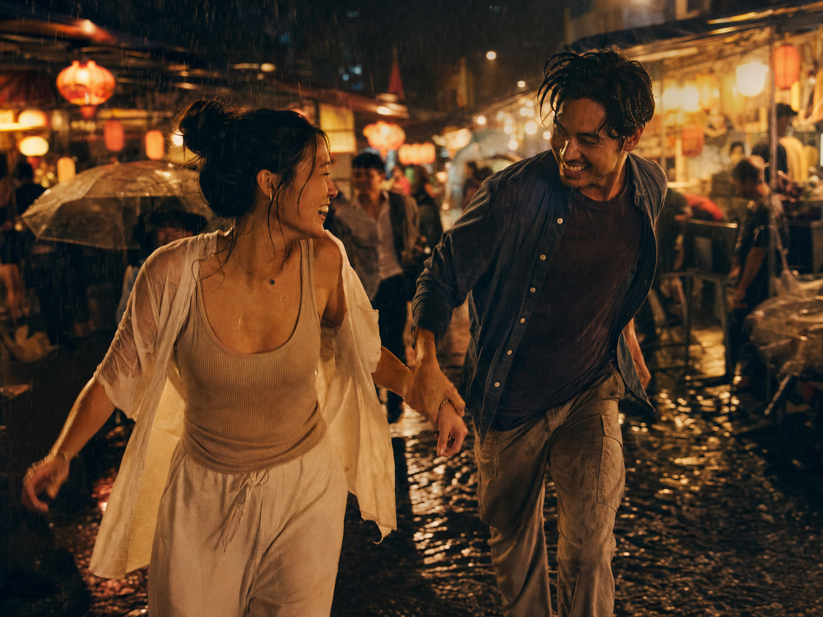 A couple laughing as they run hand in hand through a rainy night market